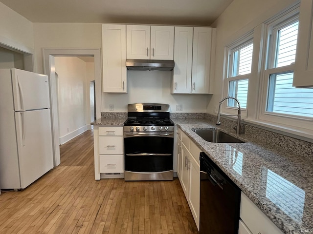 kitchen with white cabinetry, sink, stainless steel gas range oven, white fridge, and dishwasher