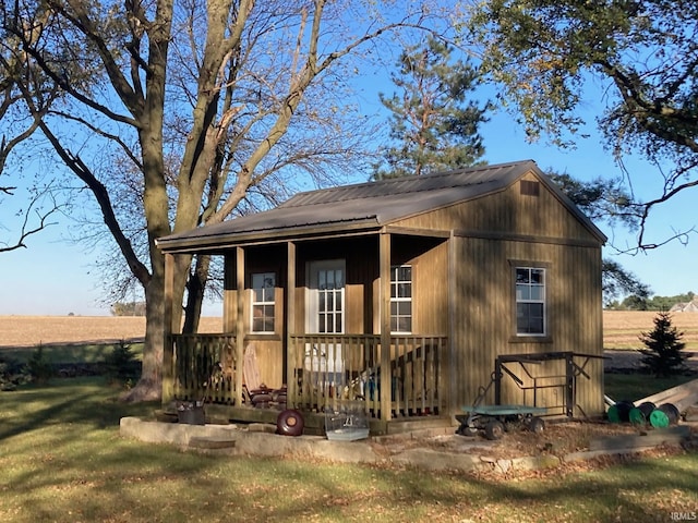 1139 E 600 N, Fowler, IN 47944 - view of front of home featuring metal roof and an outdoor structure