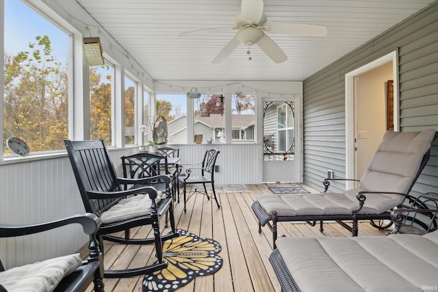 sunroom / solarium with ceiling fan