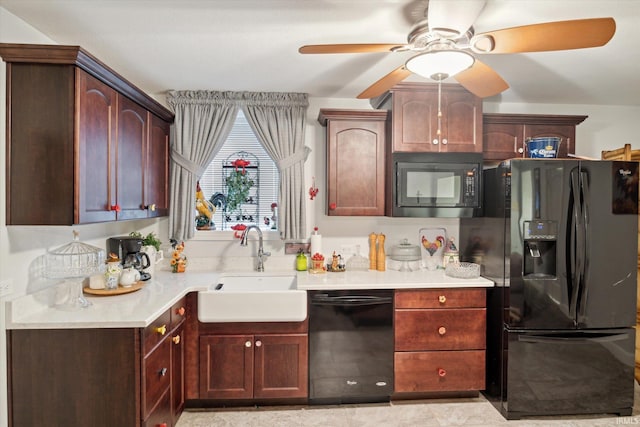 kitchen with black appliances, sink, and ceiling fan