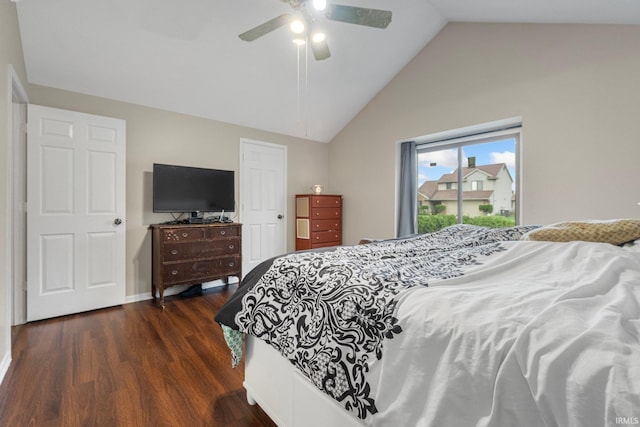 bedroom featuring high vaulted ceiling, dark wood-type flooring, and ceiling fan