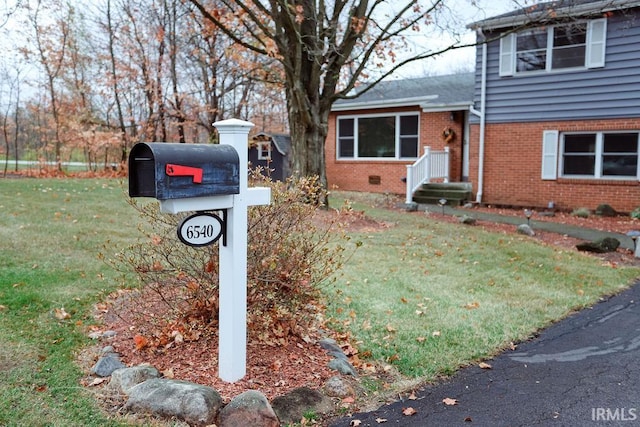 exterior space with a front yard