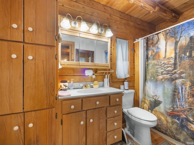 bathroom featuring vanity, a shower with shower curtain, toilet, beamed ceiling, and wooden ceiling