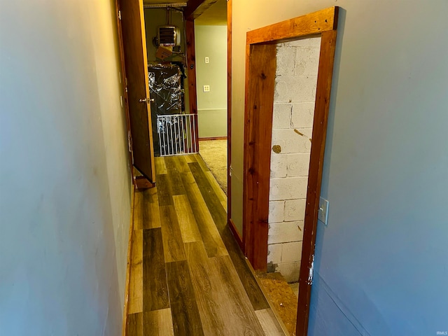 corridor featuring dark hardwood / wood-style floors