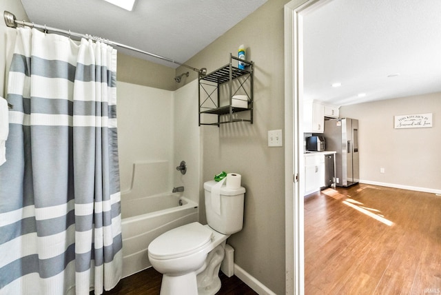 bathroom with wood-type flooring, toilet, and shower / tub combo with curtain