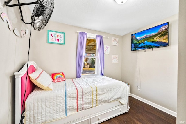 bedroom featuring dark wood-type flooring