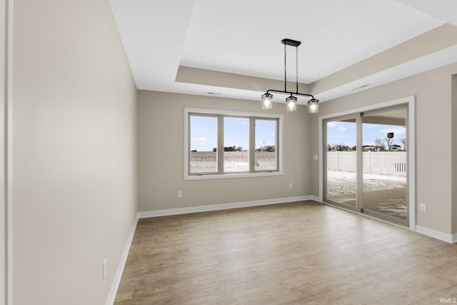 spare room with light hardwood / wood-style flooring