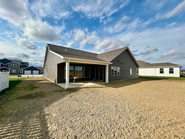 back of property featuring a patio area