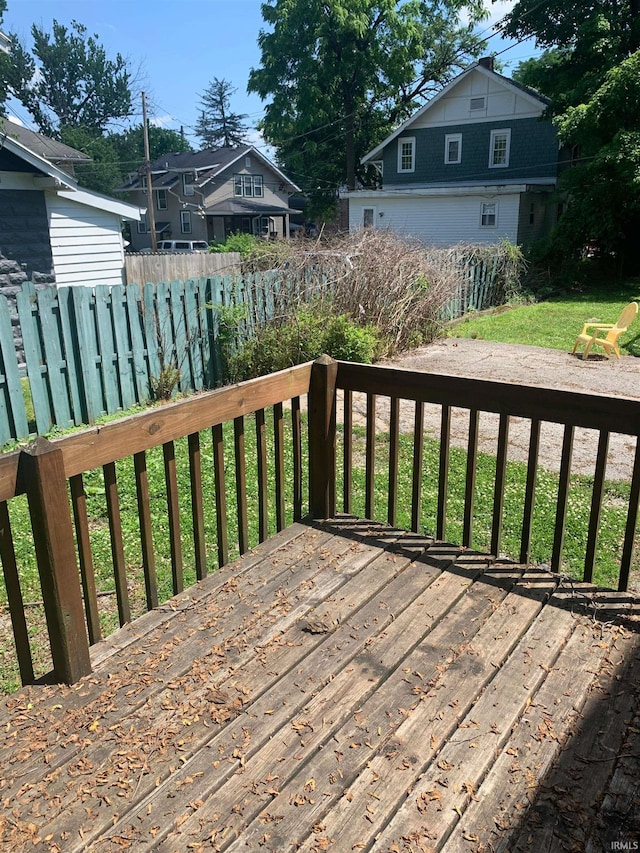 wooden deck with a yard