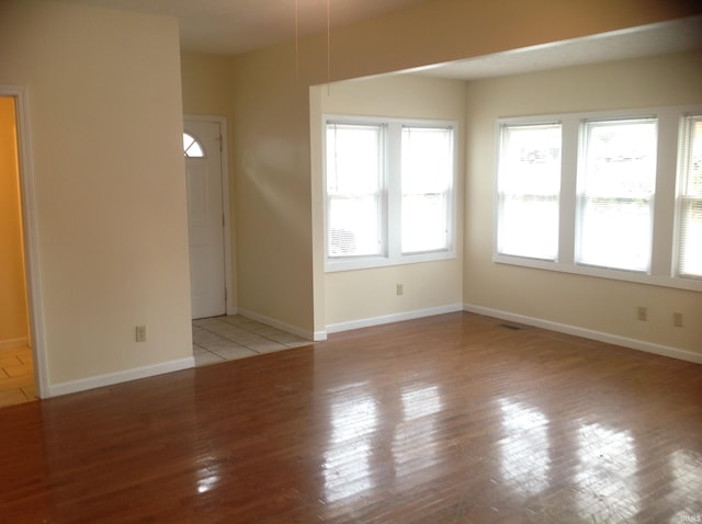 empty room with light wood-type flooring