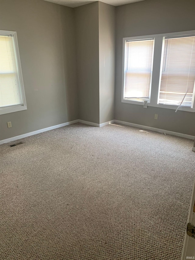 empty room with carpet floors