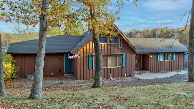856 S Balthazar Dr, Santa Claus, IN 47579 - view of front of home with board and batten siding and roof with shingles