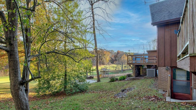 856 S Balthazar Dr, Santa Claus, IN 47579 - view of yard featuring a wooden deck and central air condition unit