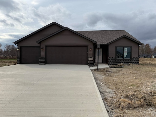 ranch-style home with a garage