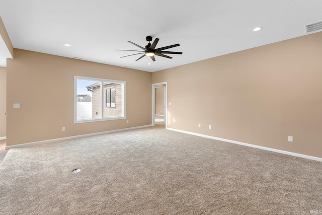 spare room featuring a ceiling fan, carpet flooring, baseboards, and recessed lighting
