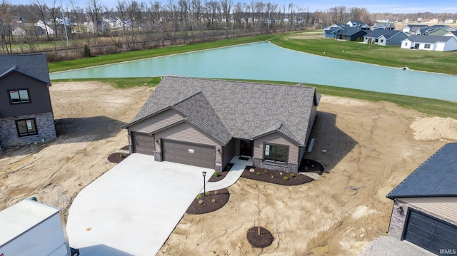 aerial perspective of suburban area with a large body of water