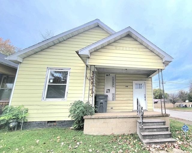 bungalow-style home with a porch