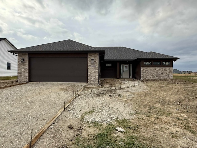 prairie-style home with a garage