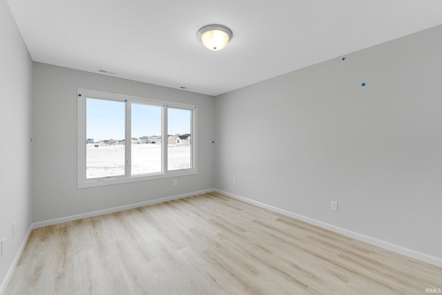 1333 Zenos Blvd, Fort Wayne, IN 46818 - empty room featuring light wood-type flooring and baseboards