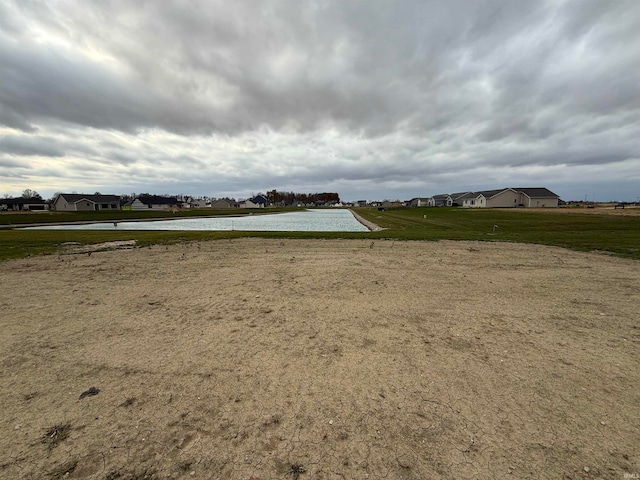 view of yard featuring a water view