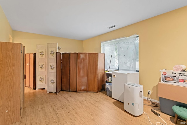 miscellaneous room featuring light hardwood / wood-style floors