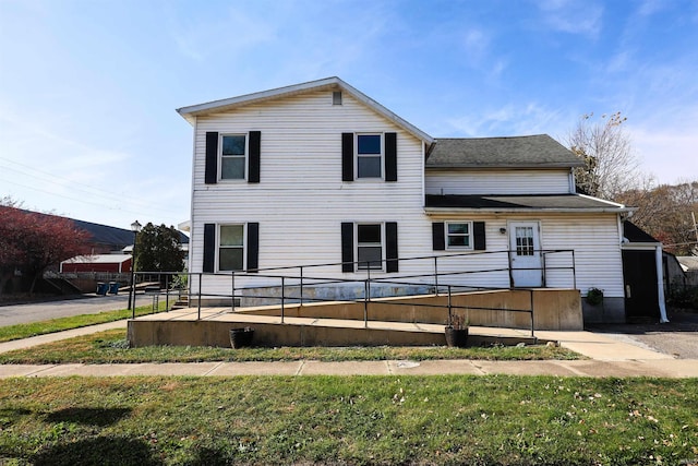 exterior space with a front lawn