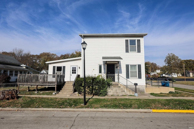 view of front of property featuring a deck