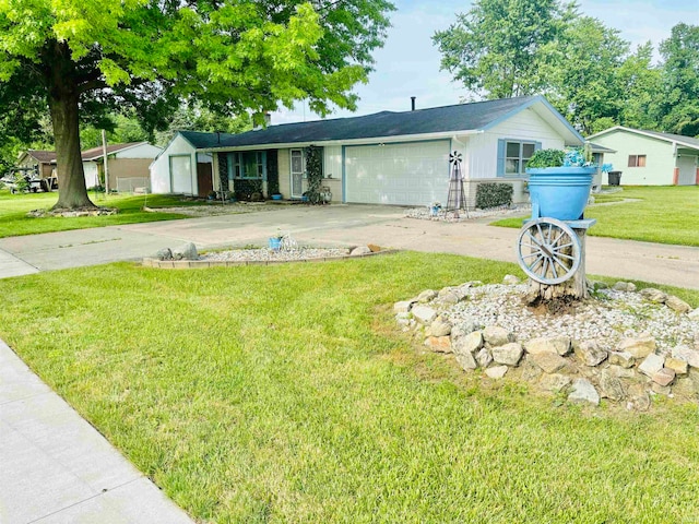 ranch-style house featuring a garage and a front yard