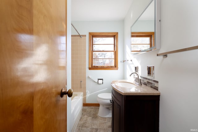 full bathroom with washtub / shower combination, vanity, and toilet