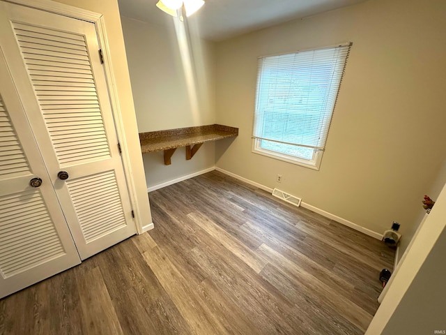 interior space with hardwood / wood-style flooring