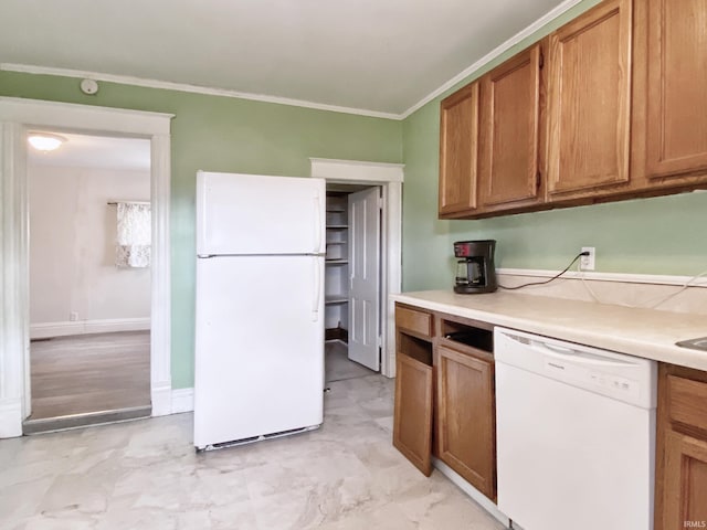 kitchen with white appliances and crown molding