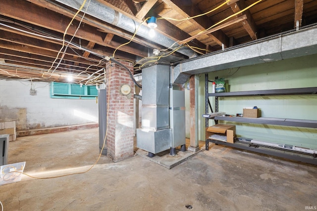 basement featuring heating unit