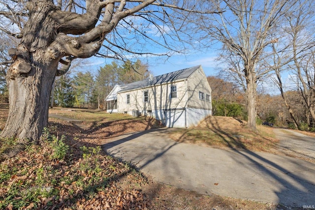 view of side of home with a garage