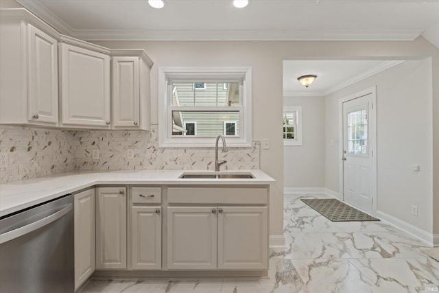 kitchen with sink, crown molding, white cabinets, dishwasher, and decorative backsplash