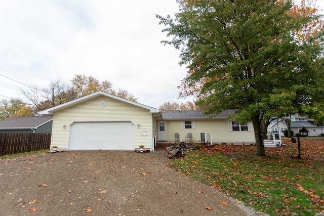 single story home with a garage