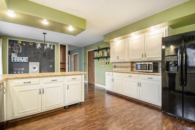 kitchen with tasteful backsplash, dark hardwood / wood-style floors, white cabinets, pendant lighting, and black fridge with ice dispenser