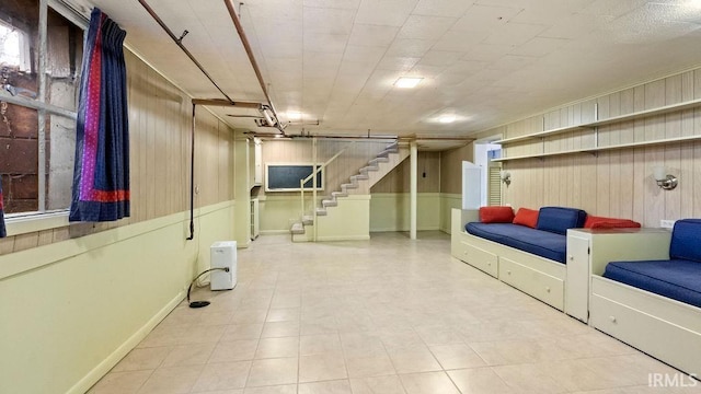 basement with wood walls