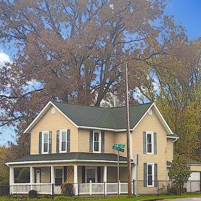 view of front of property featuring covered porch