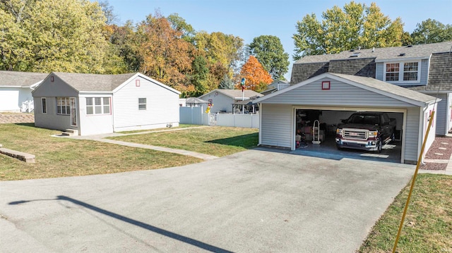 garage featuring a yard