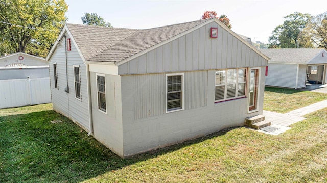 exterior space featuring a front lawn