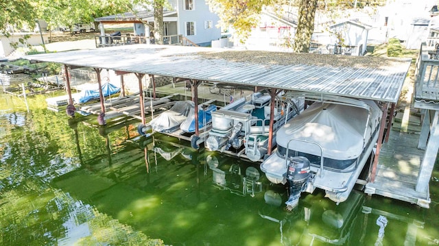 dock area with a water view