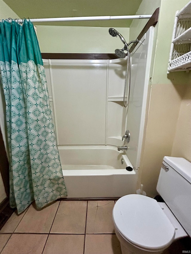 bathroom with toilet, tile patterned floors, and shower / bathtub combination with curtain