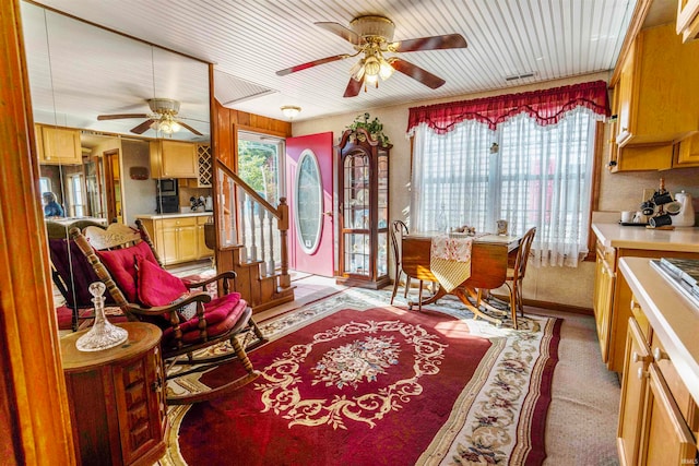 sitting room with light carpet and ceiling fan