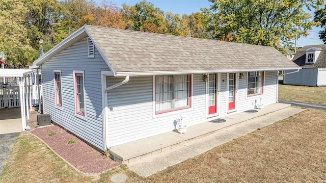 exterior space with a front lawn