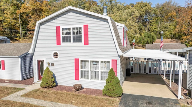 front facade featuring a carport