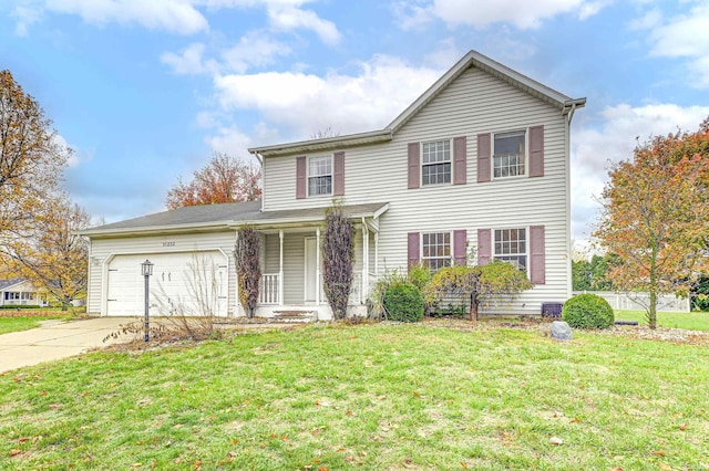 view of property featuring a garage and a front yard