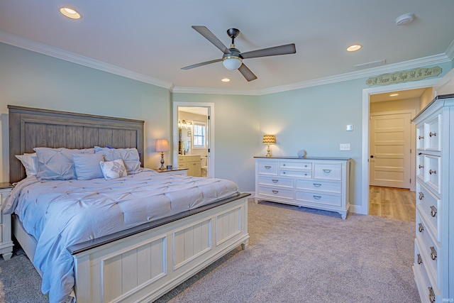 carpeted bedroom featuring connected bathroom, ceiling fan, and crown molding