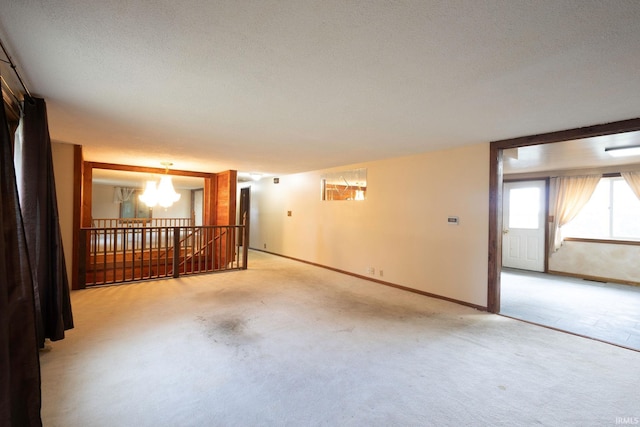 4299 E 1000 N, Roanoke, IN 46783 - empty room with a chandelier, light carpet, and baseboards