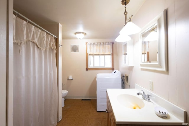 4299 E 1000 N, Roanoke, IN 46783 - full bath with toilet, washer and clothes dryer, vanity, and tile patterned floors