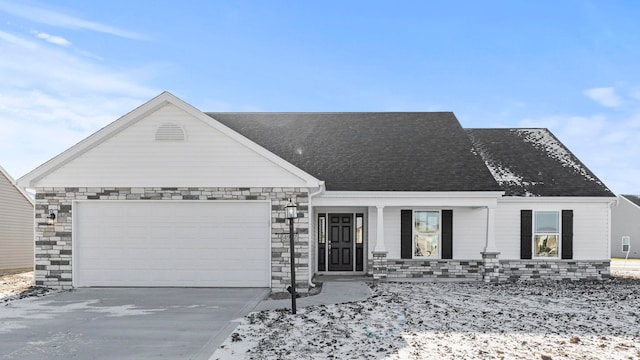 view of front of home with a garage